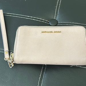 Baby pink Michael Kors wristlet/ wallet